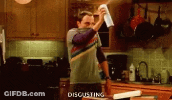 Man Holding Towel Over Face Disgusting GIF