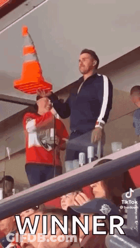 Man Holding Traffic Cone On Head GIF