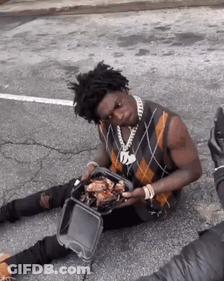 Man Holding Tray Of Food GIF