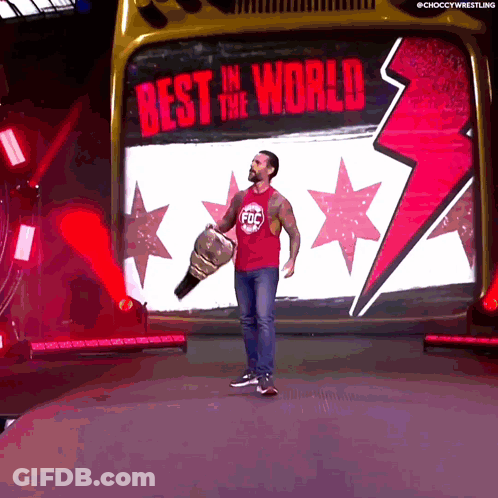 Man Holding Trophy Best In World GIF
