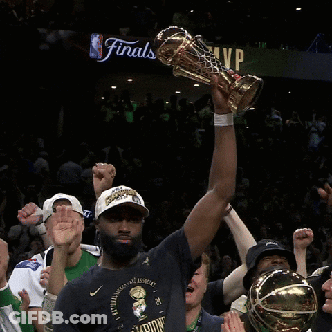 Man Holding Trophy In Front Of NBA Finals Sign GIF