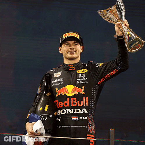 Man Holding Trophy In Front Of Star Saying 21 GIF