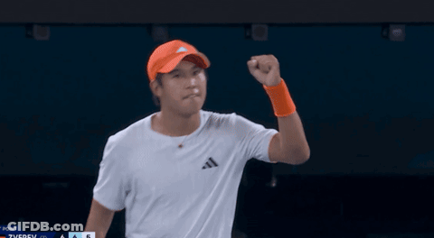 Man Holding Trophy Number 75 GIF