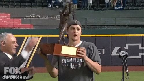 Man Holding Trophy Saying Fox Deportes GIF