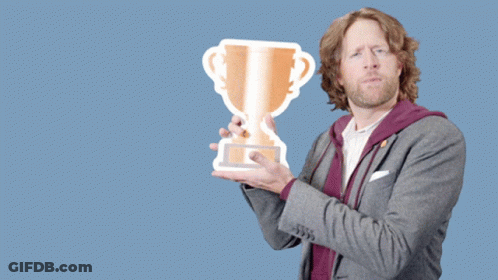 Man Holding Trophy Saying You Deserve A Trophy GIF