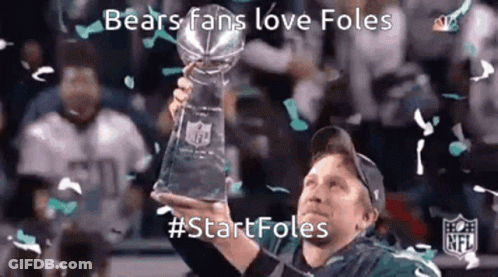 Man Holding Trophy With Confetti GIF