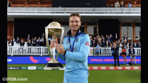 Man Holding Trophy With England On Shirt GIF