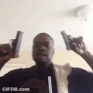 Man Holding Two Guns With Straw GIF