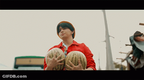 Man Holding Two Watermelons GIF