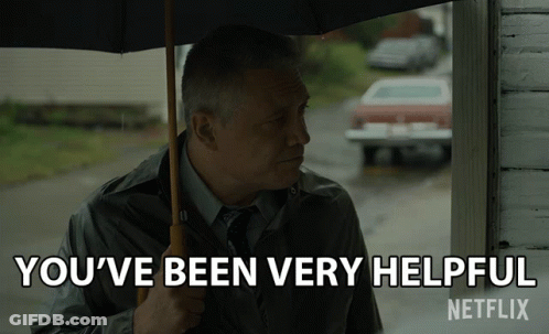 Man Holding Umbrella In Rain Says You've Been Very Helpful Netflix GIF