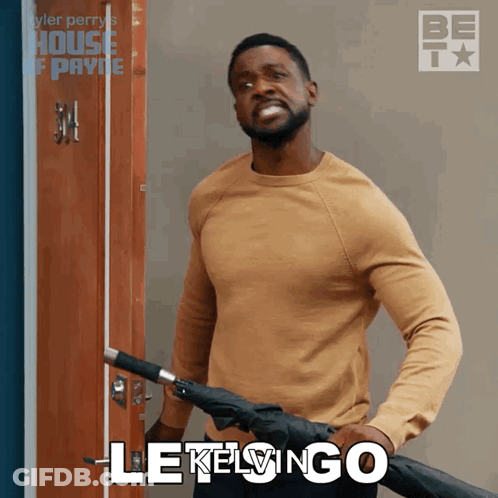Man Holding Umbrella With Lekelingo GIF