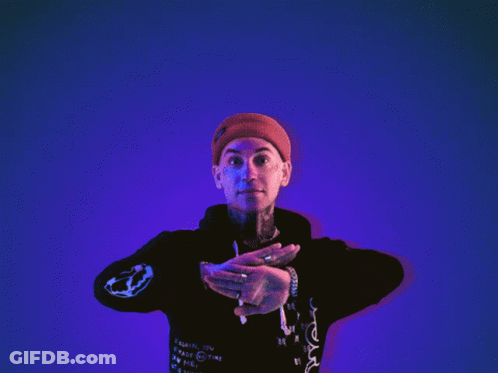Man Holding Up Hands In Front Of Anxiety Neon Sign GIF