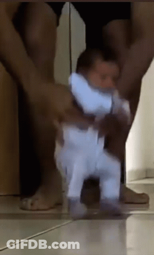 Man Holding Walking Baby GIF