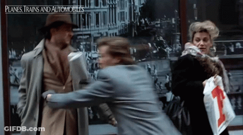 Man Holding Water Cup Says Titos High Quality H2O GIF