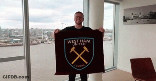 Man Holding West Ham Flag GIF
