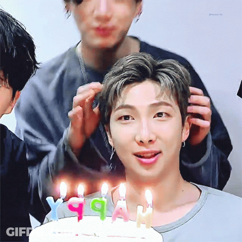 Man Holding White Cake With Candle GIF
