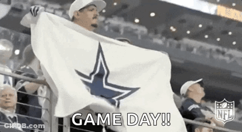 Man Holding White Flag With Cowboy Star In Stadium GIF