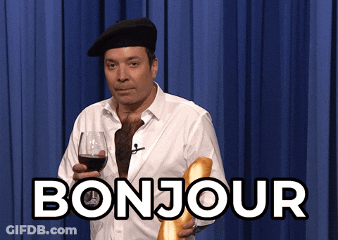 Man Holding Wine Glass And Bread With Bonjour GIF