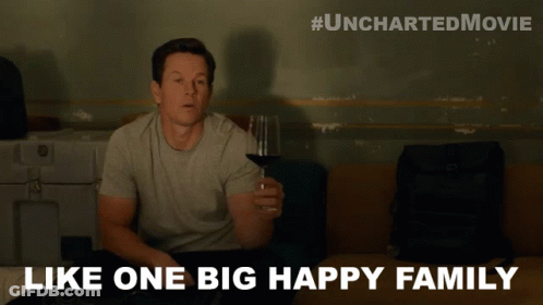 Man Holding Wine Like One Big Happy Family GIF