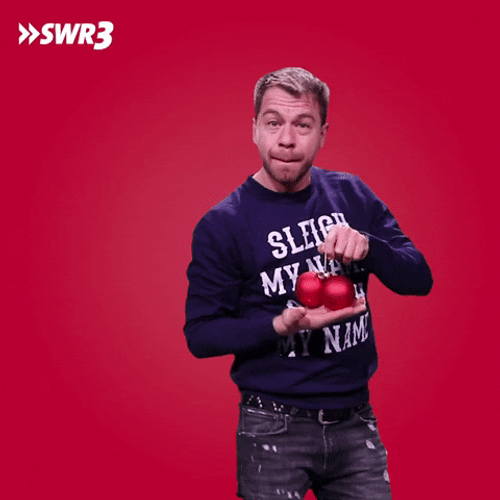Man Holding Winter Christmas Balls GIF