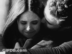 Man Holding Woman And Kissing GIF