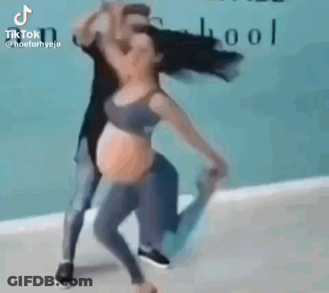 Man Holding Woman Dancing GIF