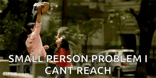 Man Holding Woman In Arms GIF