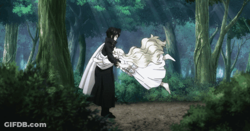 Man Holding Woman In Forest GIF