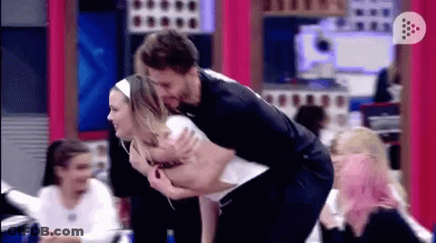 Man Holding Woman On His Back GIF