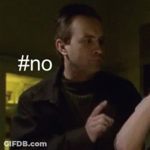 Man Holding Woman's Arm In Dark Room GIF