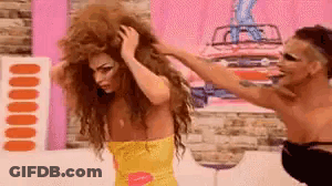 Man Holding Woman's Hair Woman In Yellow Dress GIF