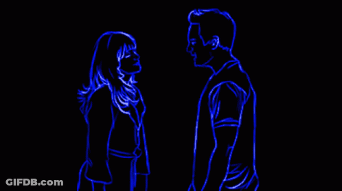 Man Holding Woman's Hand In Dark GIF