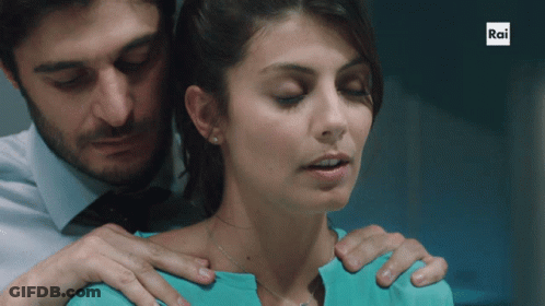 Man Holding Woman's Shoulder With Rai GIF