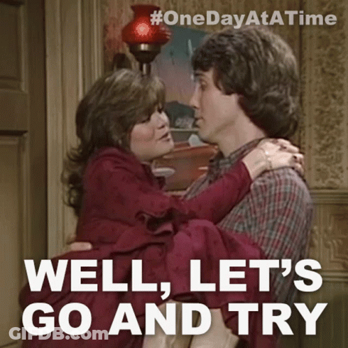 Man Holding Woman Saying Well Let's Go And Try GIF
