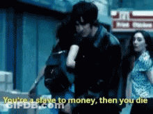 Man Holding Woman Saying Youre A Slave To Money GIF
