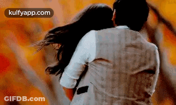 Man Holding Woman While Dancing GIF