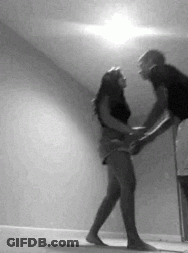 Man Holding Woman While Dancing GIF