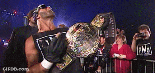 Man Holding Wrestling Belt GIF