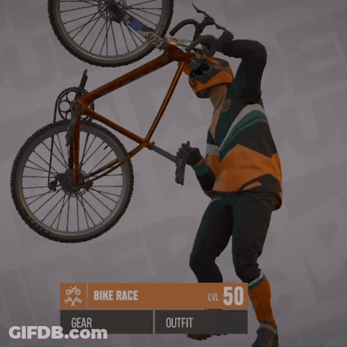Man Holds Bike Overhead Bike Race Gear Outfit GIF