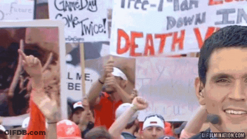 Man Holds Sign Saying Death GIF