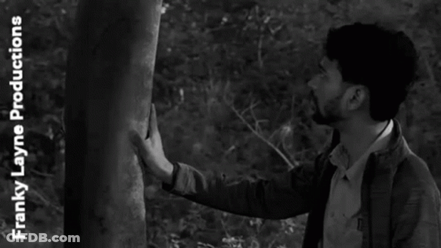 Man Holds Siren Head Foot GIF