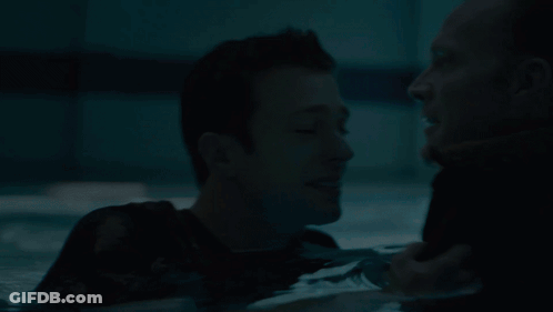 Man Hugging Another Man In Water GIF