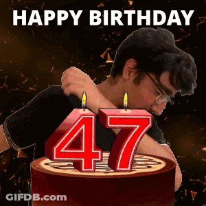 Man Hugging Birthday Cake With Candles Saying 47 GIF