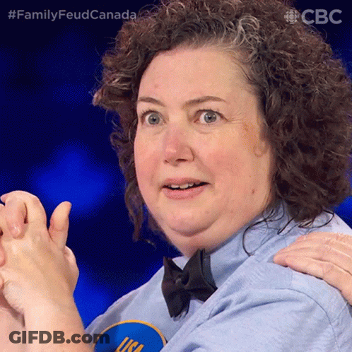 Man Hugging Woman In Blue Shirt With Fork GIF
