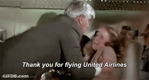 Man Hugging Woman On Plane Saying Thank You GIF