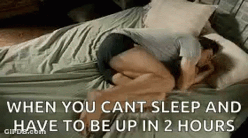 Man Hugging Woman Sleeping On Bed GIF