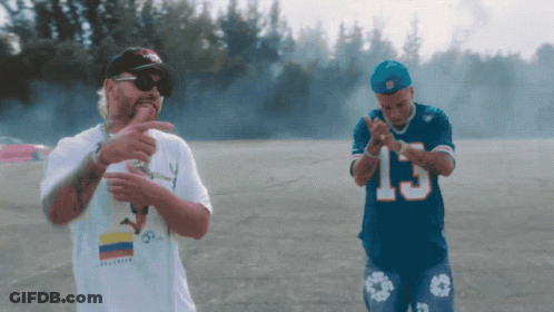 Man In 15 Jersey Beside White Shirt Man GIF