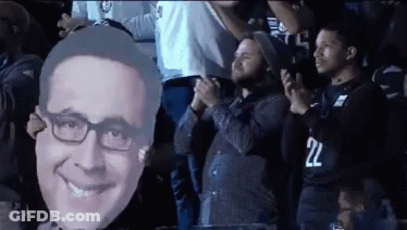 Man In 22 Jersey Holding Man Face Cutout GIF