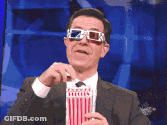 Man In 3D Glasses Holding Popcorn GIF