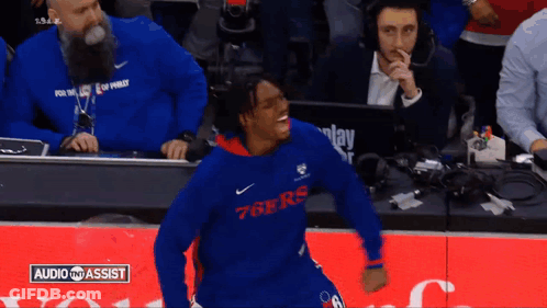 Man In 76Ers Sweatshirt Dancing On Basketball Court GIF